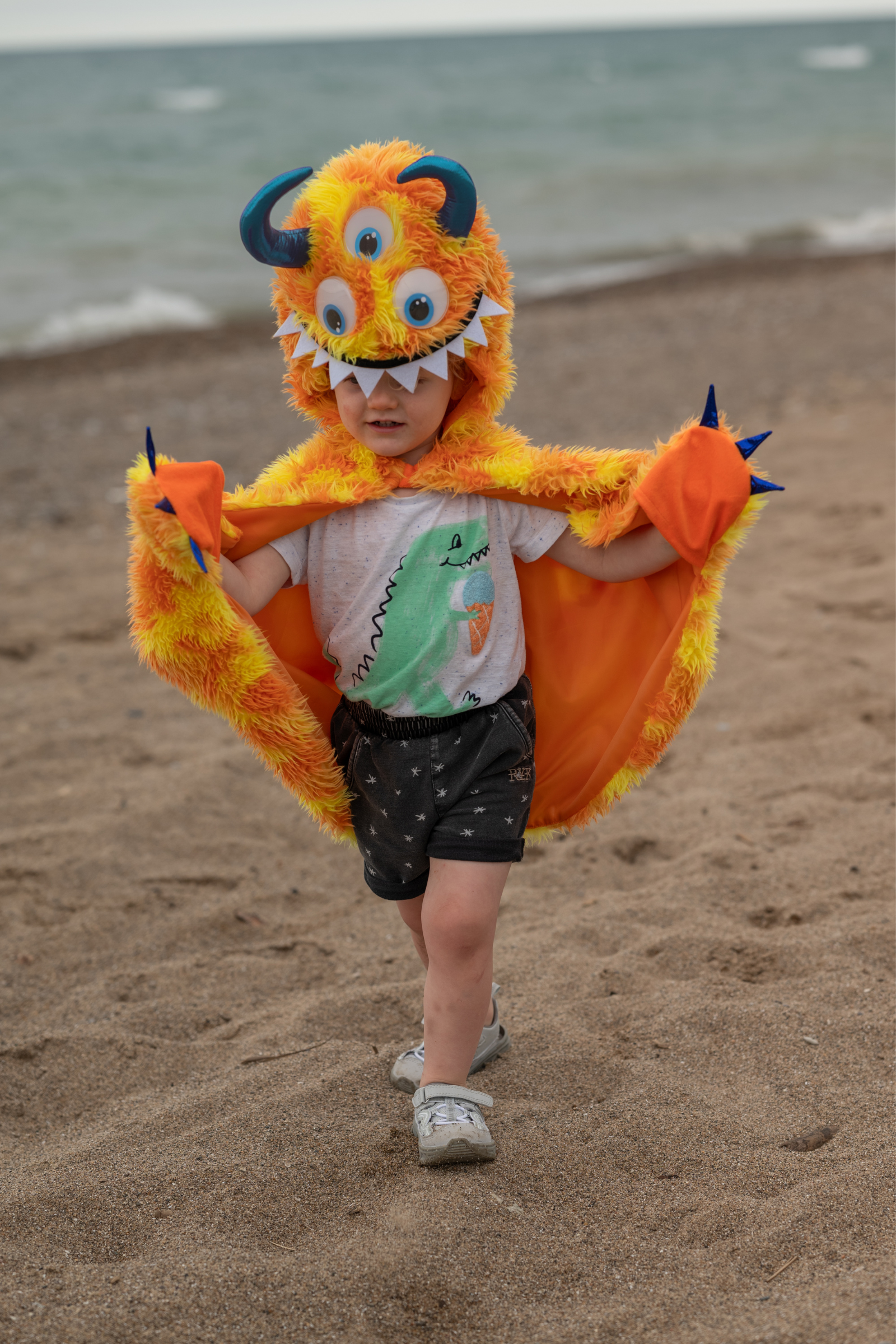 Giggle the Monster Cape, Orange/Yellow