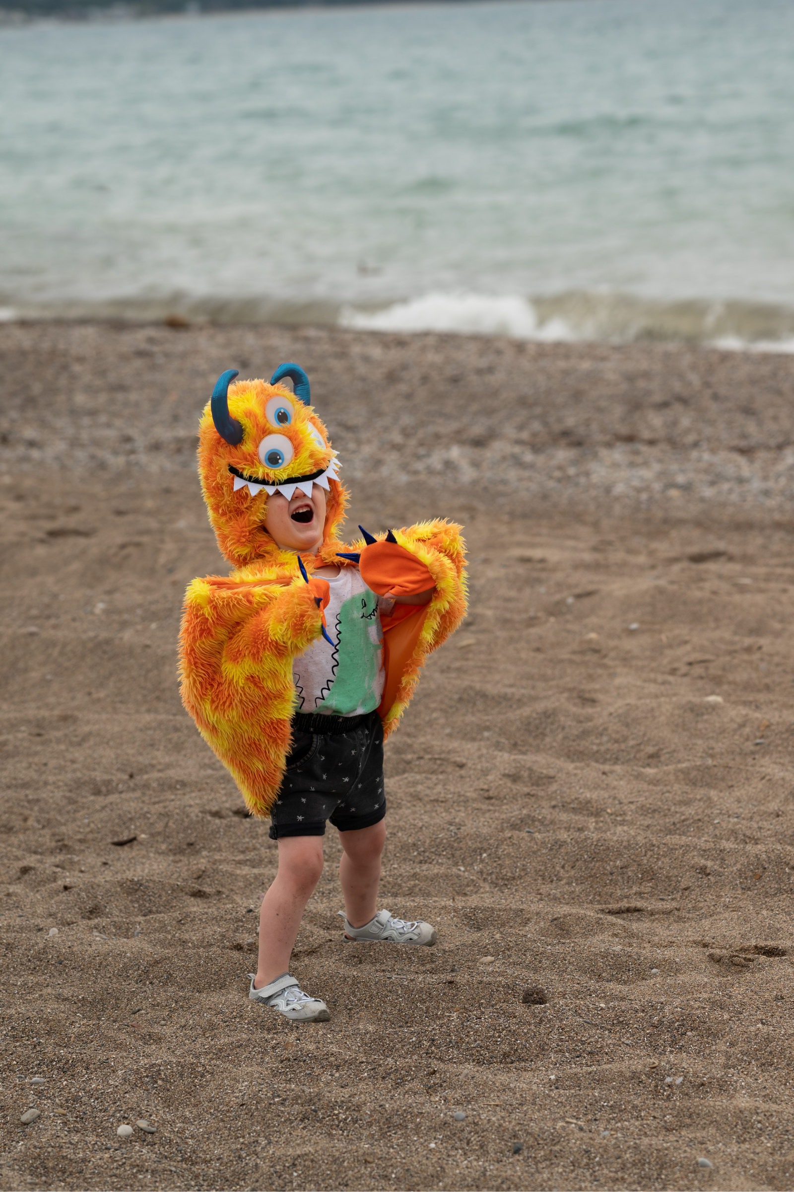 Giggle the Monster Cape, Orange/Yellow